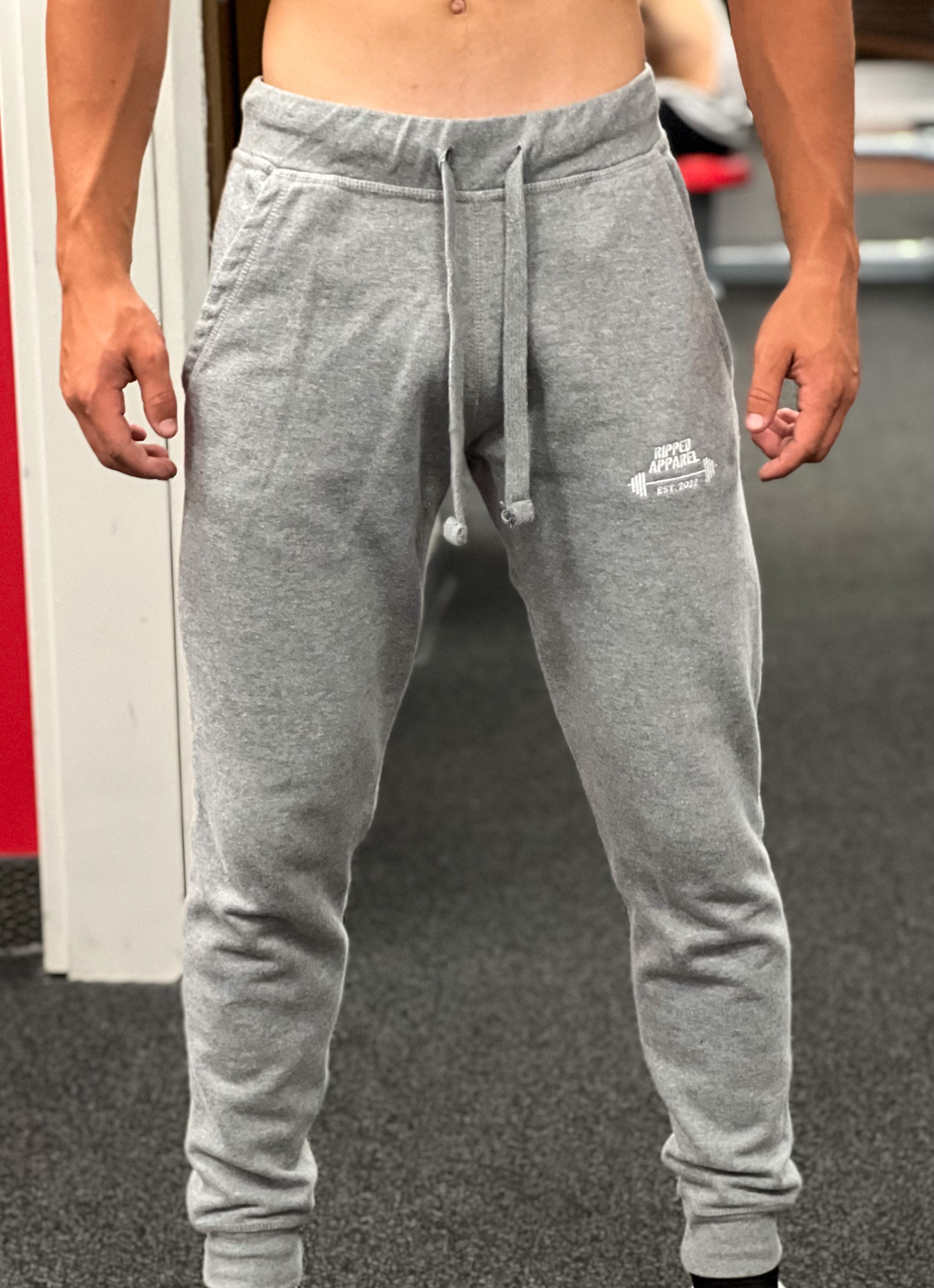 Ripped grey online sweatpants